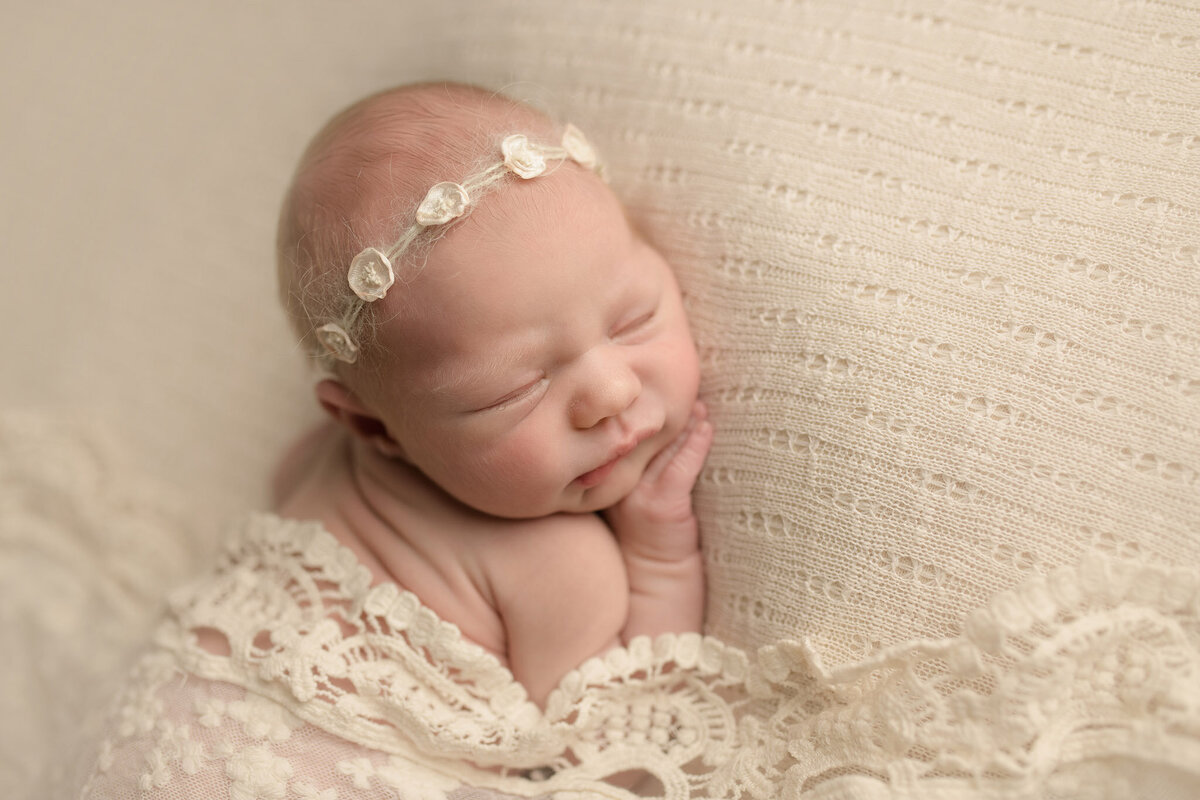 Newborn baby girl sleeping during boston newborn photographty session