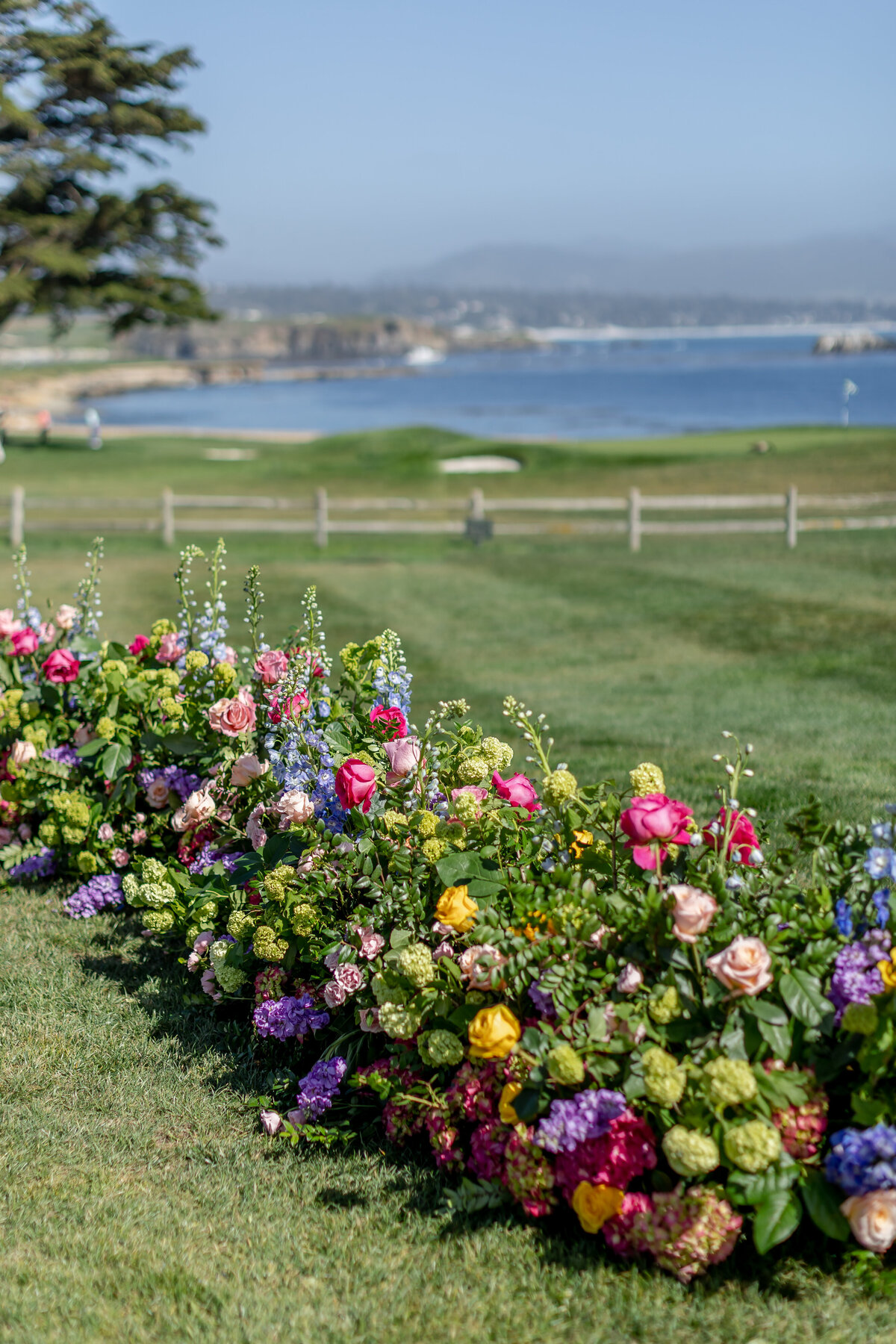 Colorful flowers at a ceremony at Pebble Beach