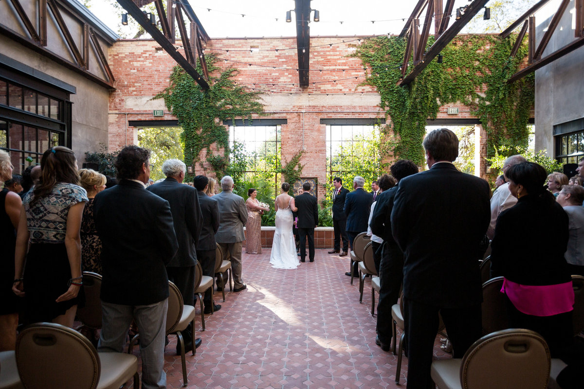 bride and groom at the Pearl brewery Wedding Ceremony at Hotel Emma outdoor wedding