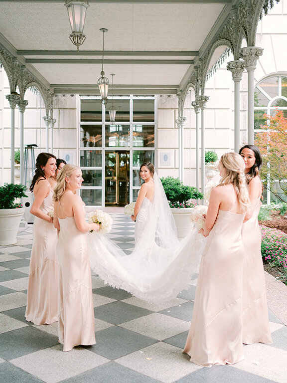 Bride with bridesmaids at  at Hotel Crescent Court, Dallas