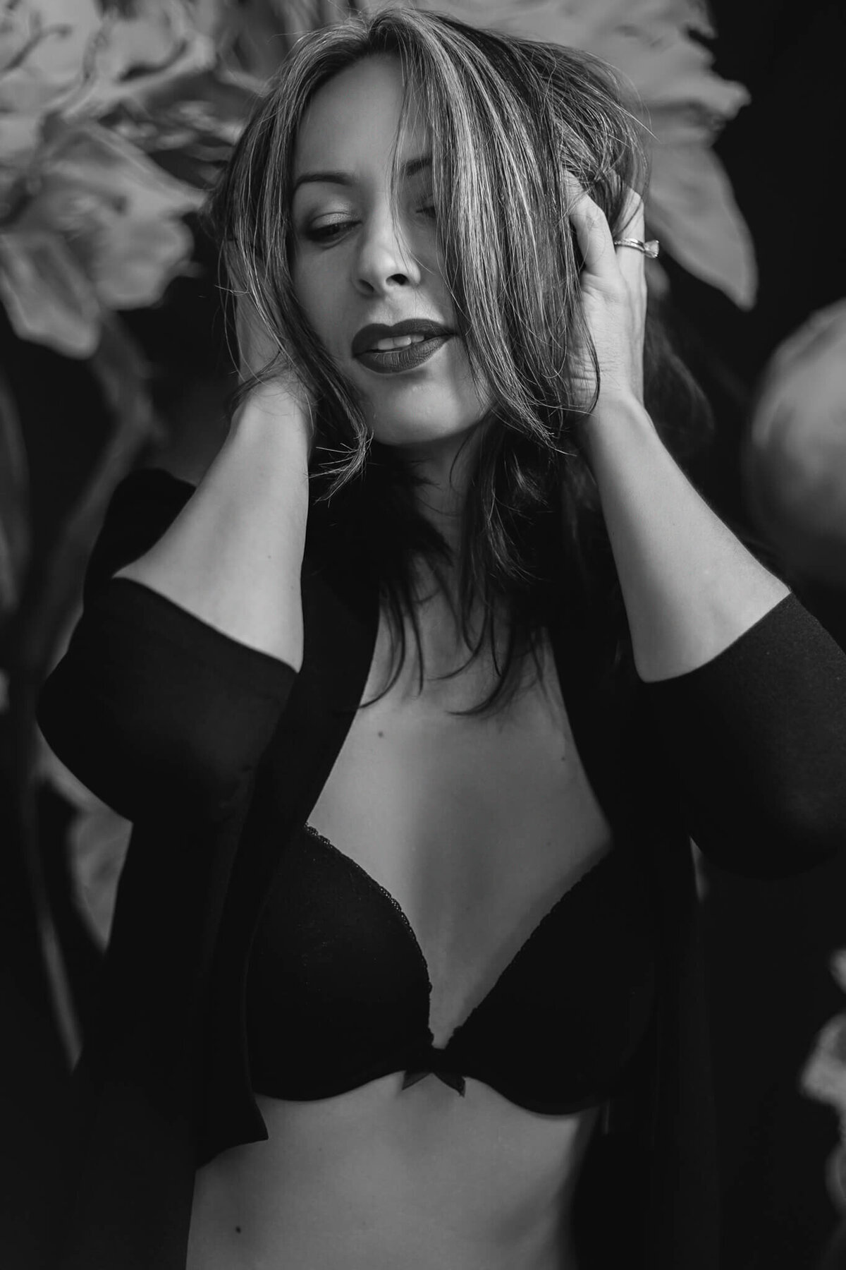 Photo of woman grabbing her hair in a sexy way