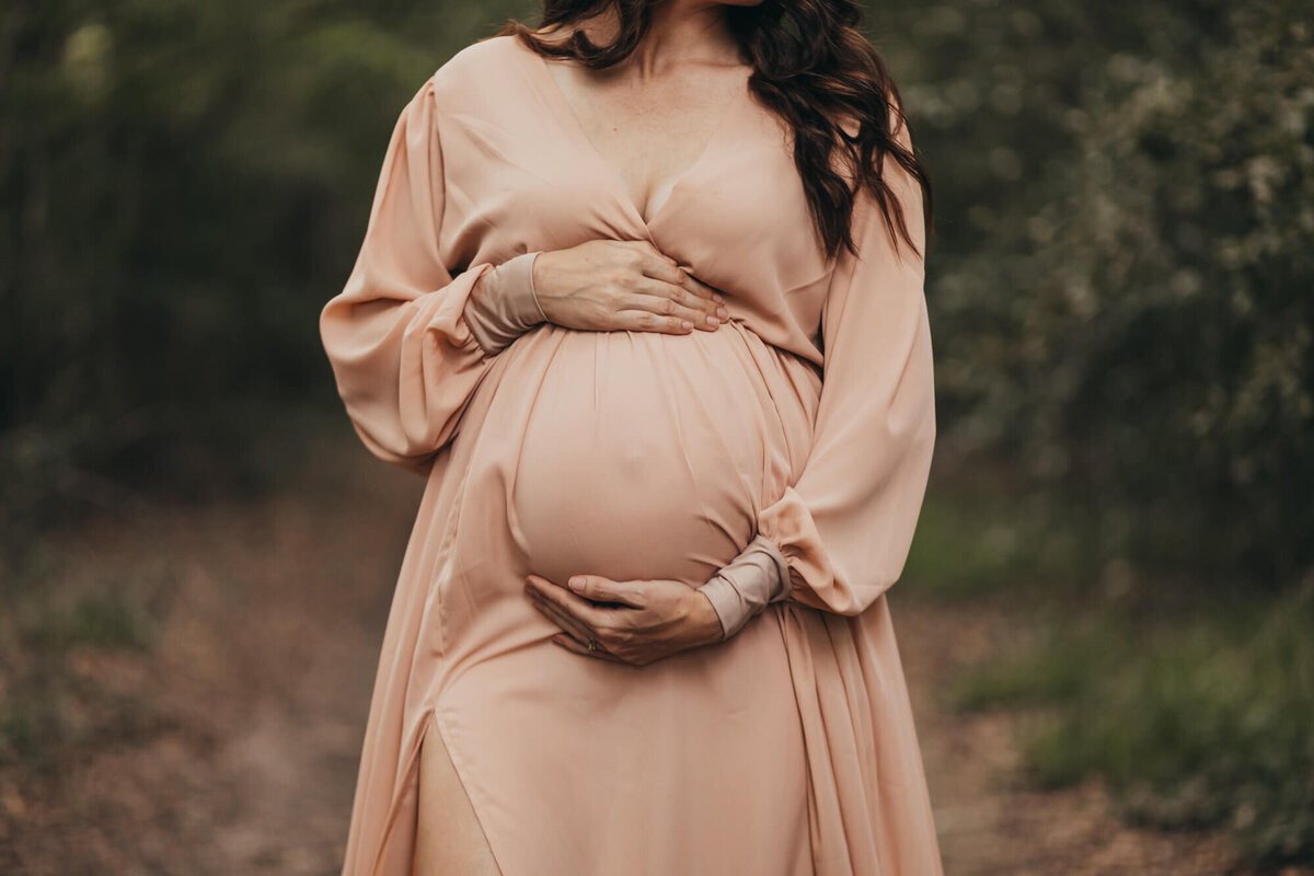 up close of mamas belly during her maternity shoot