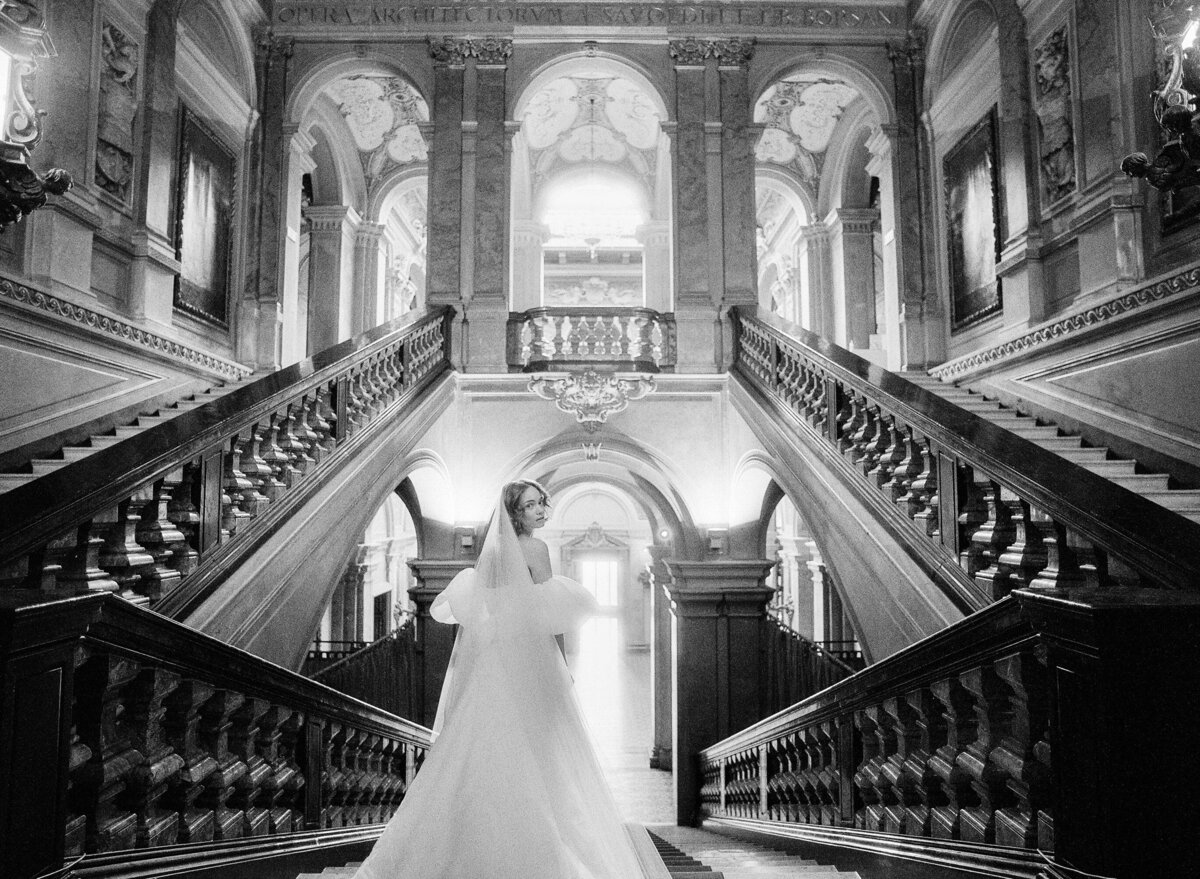 Bride in grand staircase of Villa Erba on Lake Como photographed by Italy Wedding photographer