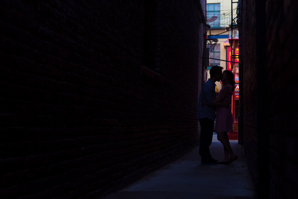 Silhouette portrait of couple in Victoria Chinatown