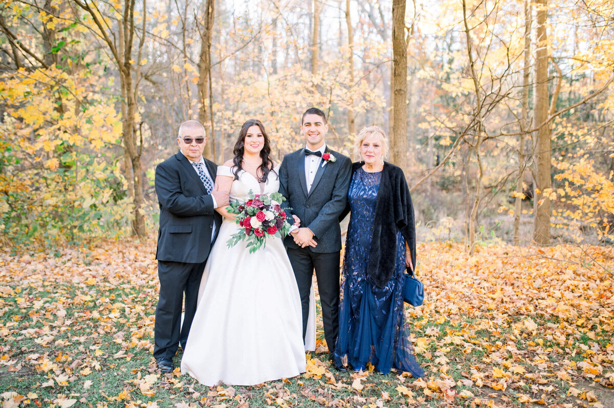 Bride and groom portraits with family