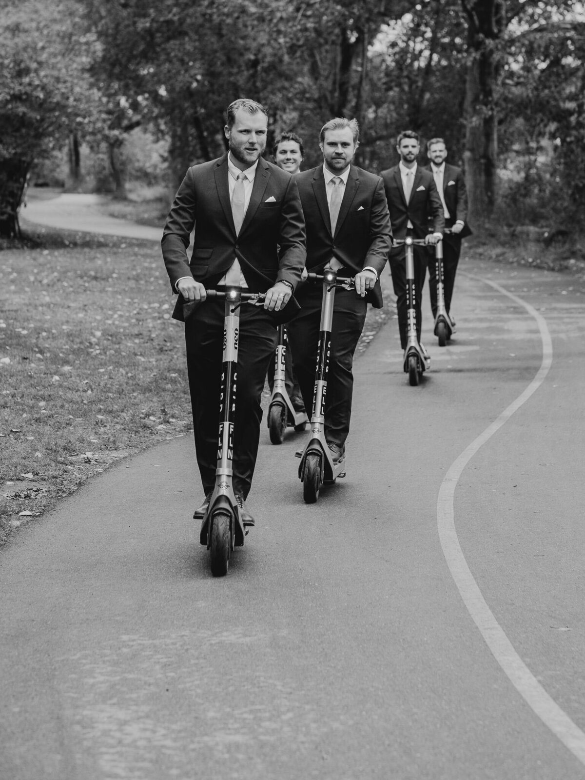 groom-and-groomsmen-on-scooters