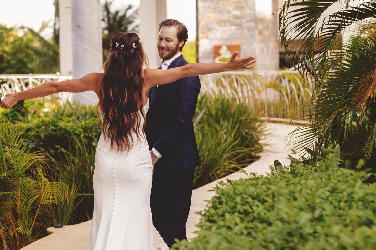 Bride and grooms first look at wedding in Cancun