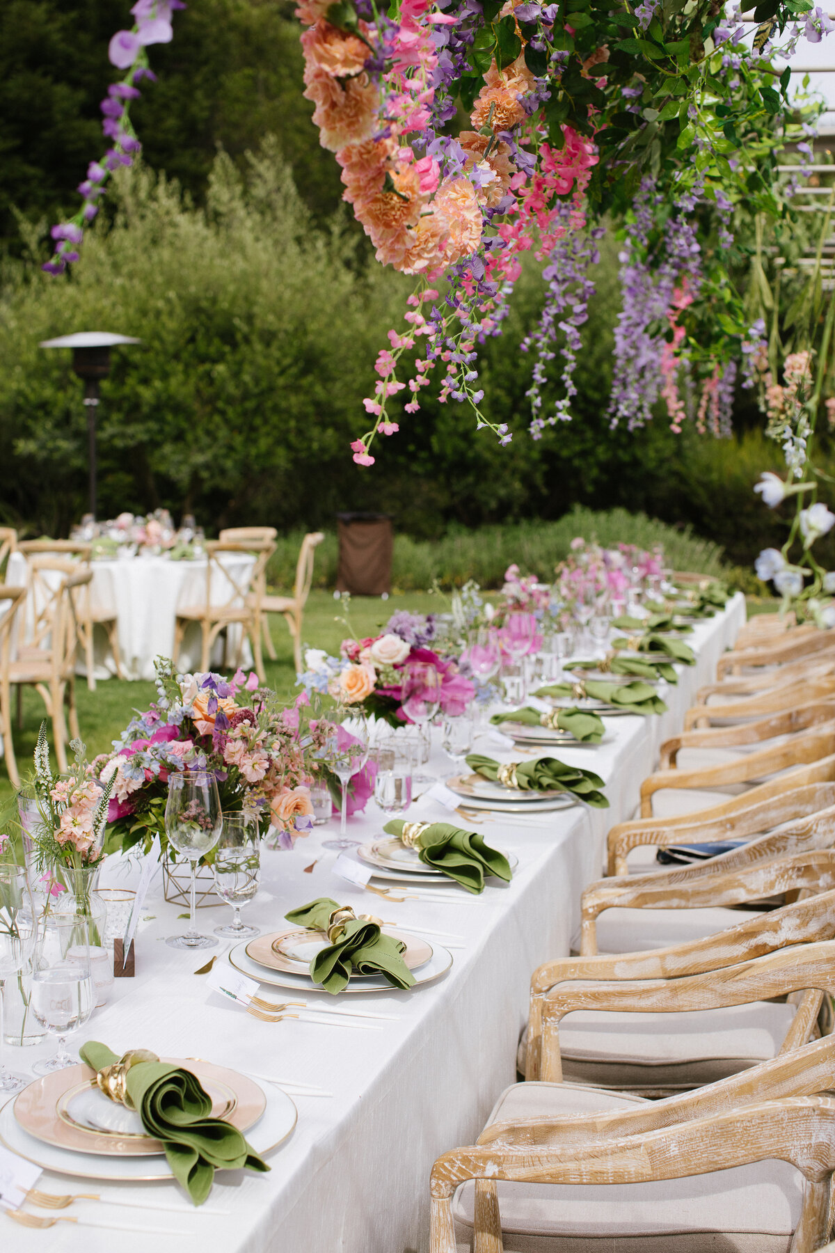 Colorful hanging flowers at head table