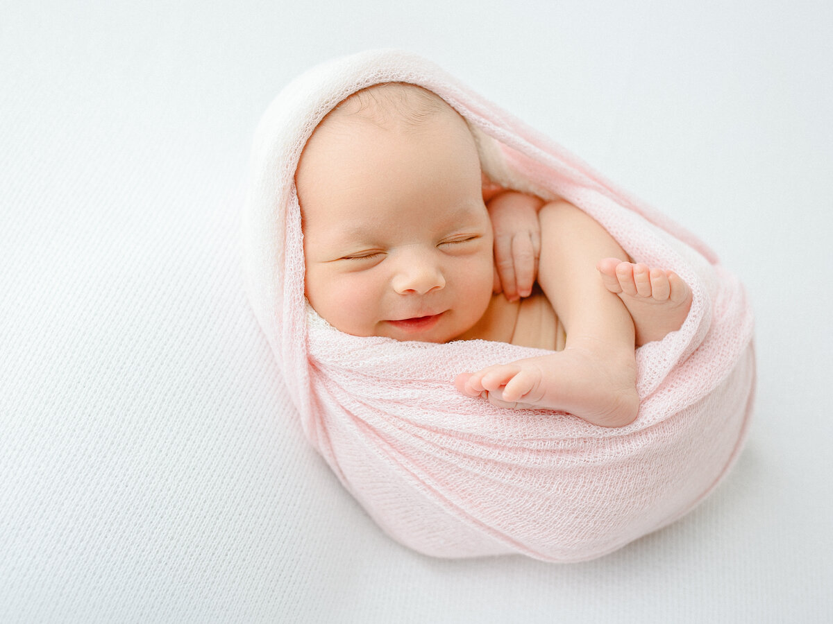baby-girl-smiling-san-diego-newborn-photography-session-sloane