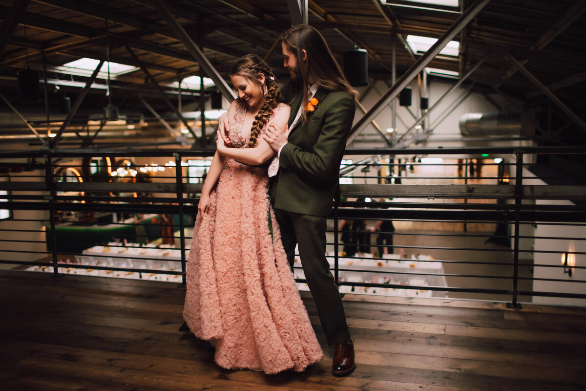 Bride and groom dance in the loft at The Tinsmith