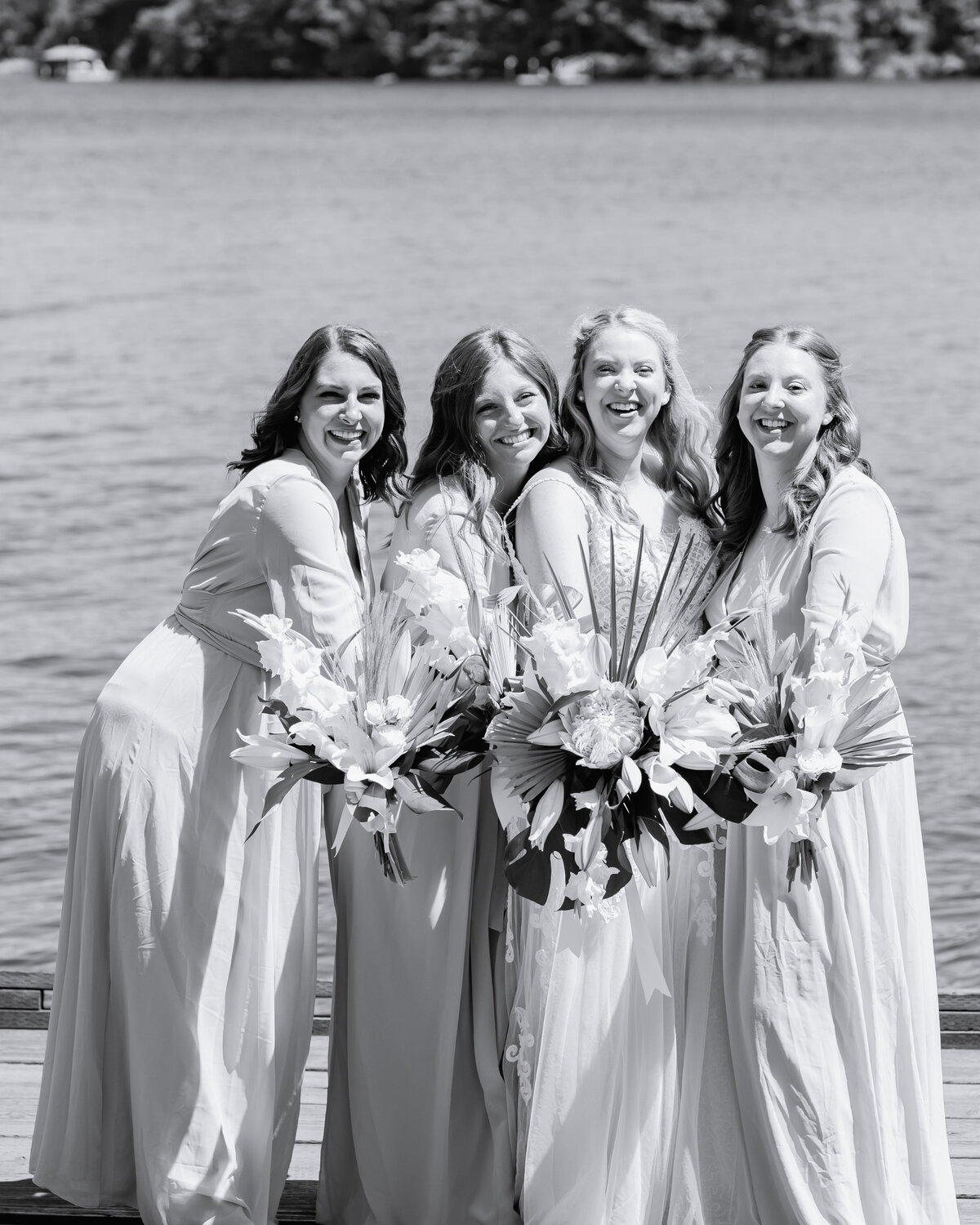 Bride with bridesmaids photo in front of Lake Tahoe