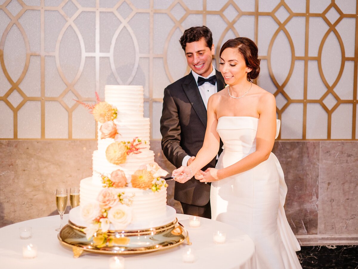 Event-Planning-DC-Wedding-Mayflower-Hotel-DC-Anna-&-Mateo-couple-cake