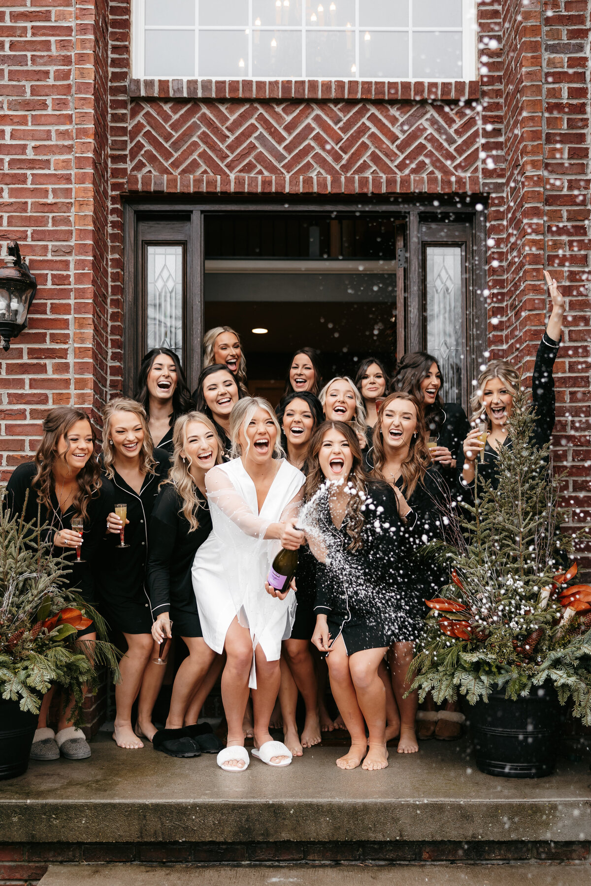 bride getting ready with girls, popping bubbles