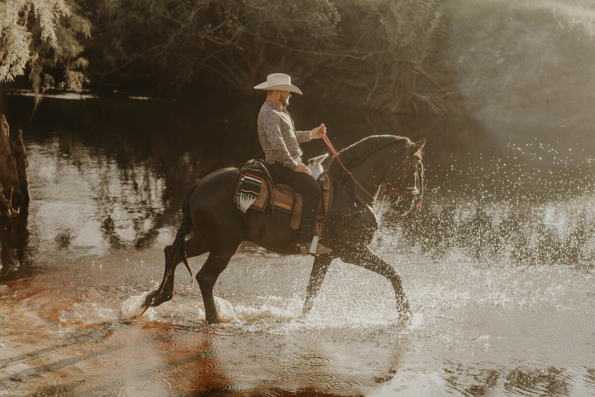This image is of a groom on horseback.