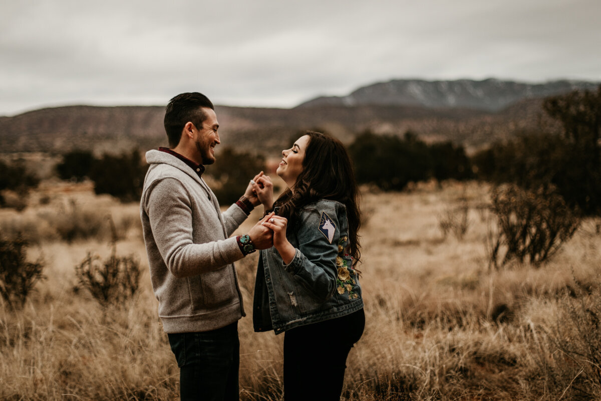 man and woman dancing in New Mexico desert