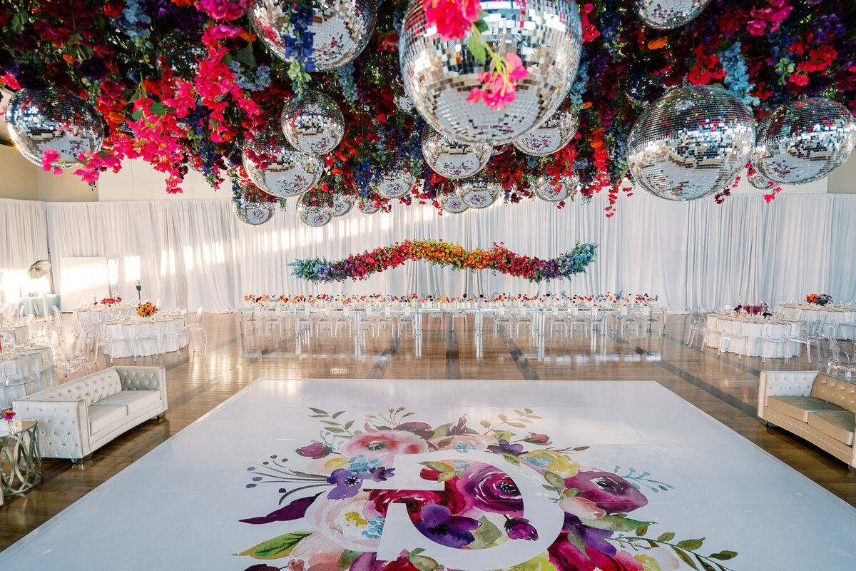 custom vinyl dance floor with watercolor flowers and white monogram