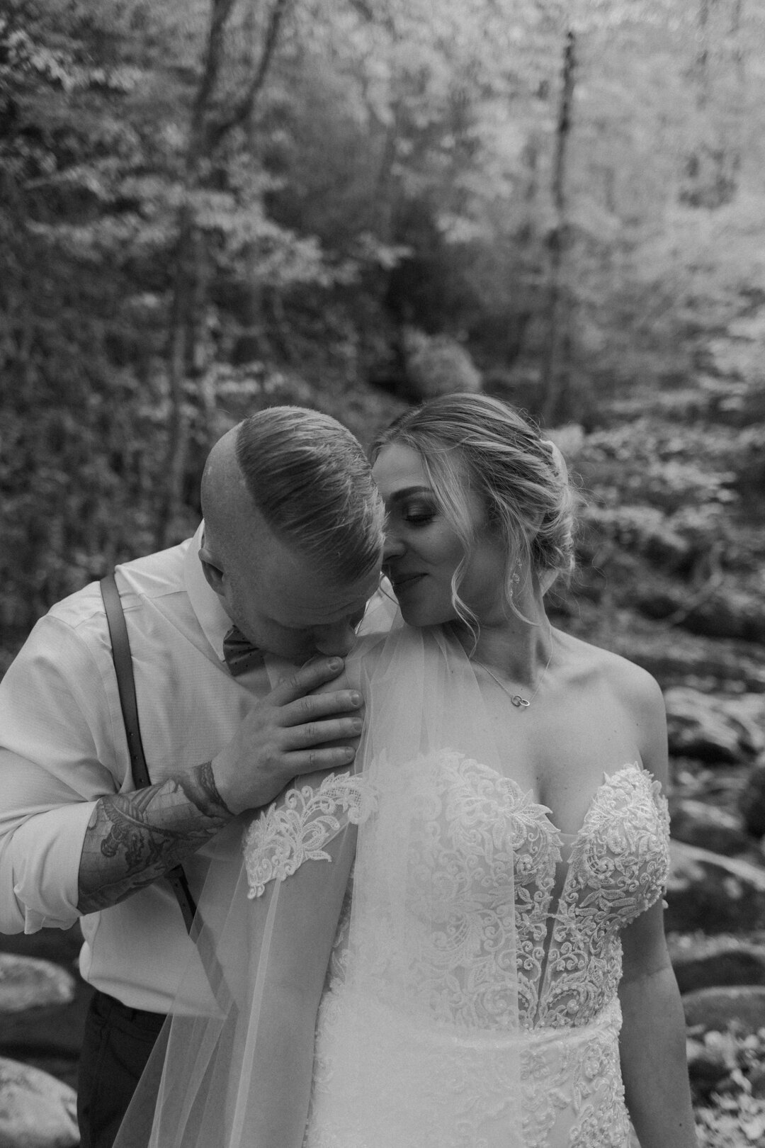 Black and white portrait of bride and groom at their Smoky Mountain elopement.