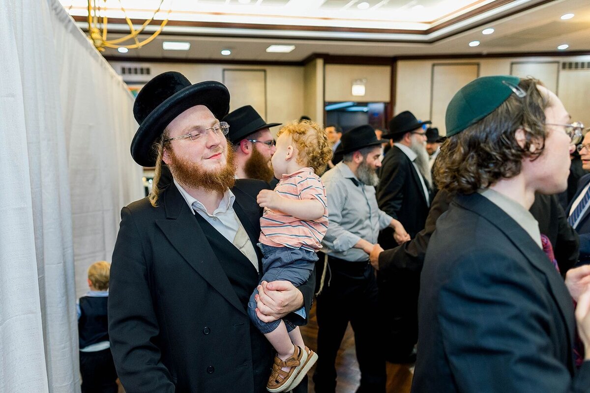 Eliana-Melmed-Photography-Chicago-LosAngeles-Jewish-WeddingPhotographer-CarmiKalman-MensDancing-00116