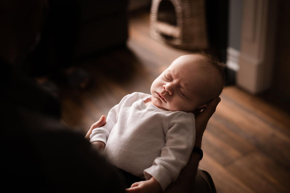 Sleepy baby boy in Toronto newborn photography