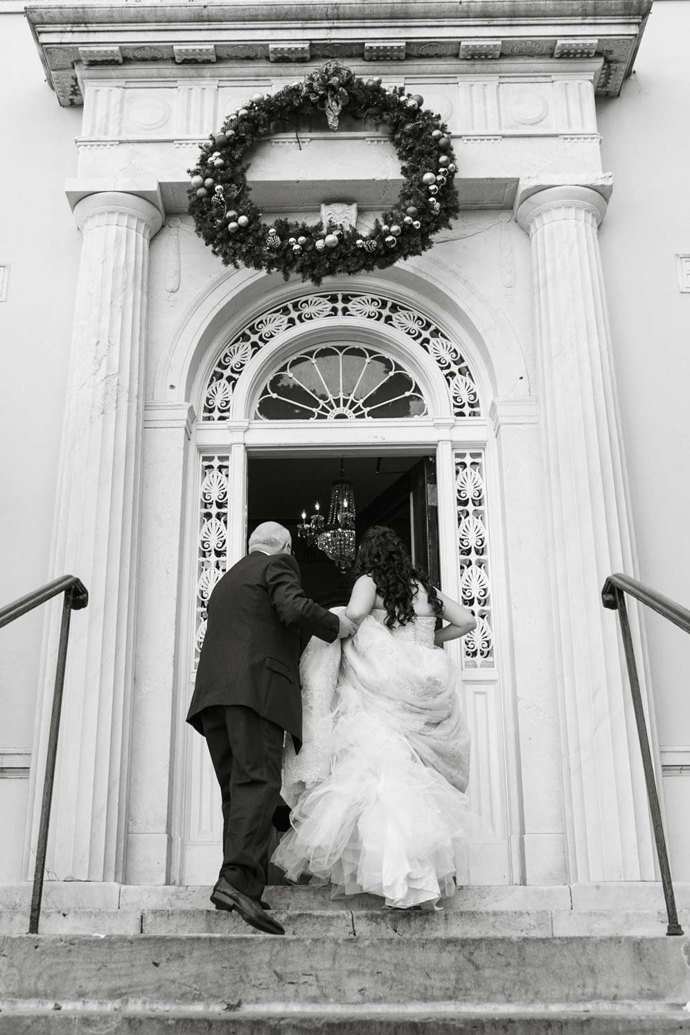 Bride walking into The Mansion at Oyster Bay