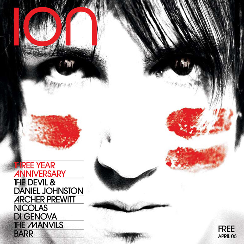 Magazine Cover Publication Ion featuring lead singer of band The Manvils in closeup black and white red streaks across his cheeks