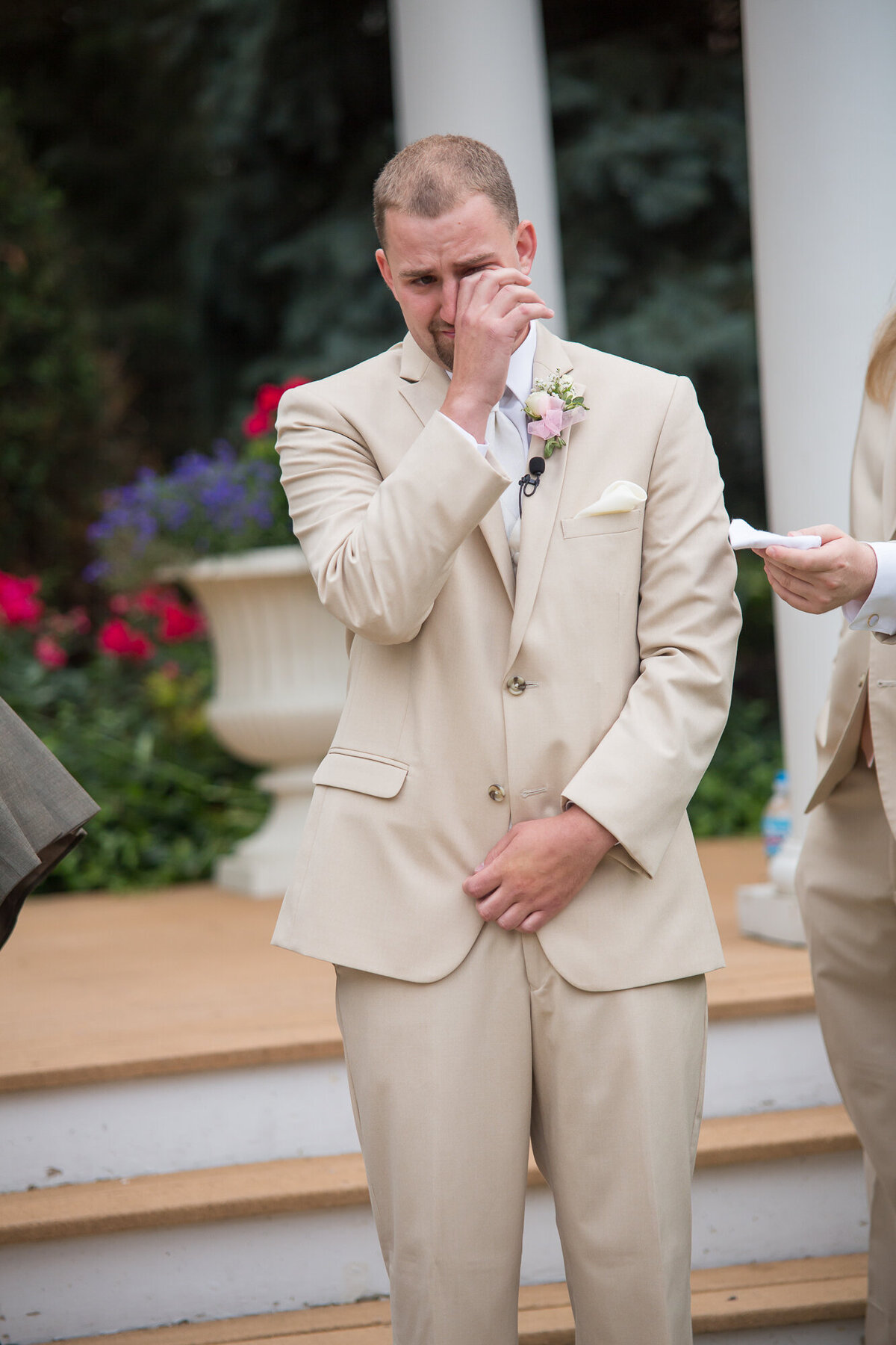 A groom cries when seeing his bride walk down the aisle in Joliet, IL.