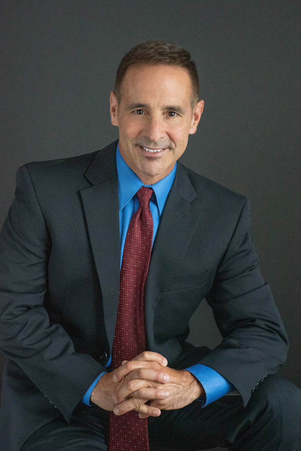 LinkedIn profile headshot for Orlando professional - Khim Higgins Photography