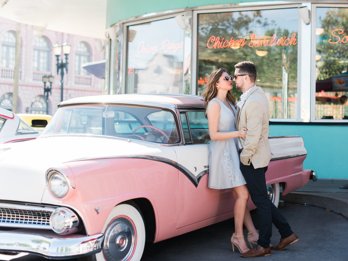 Couple gets cozy in Islands of Adventure during engagement session