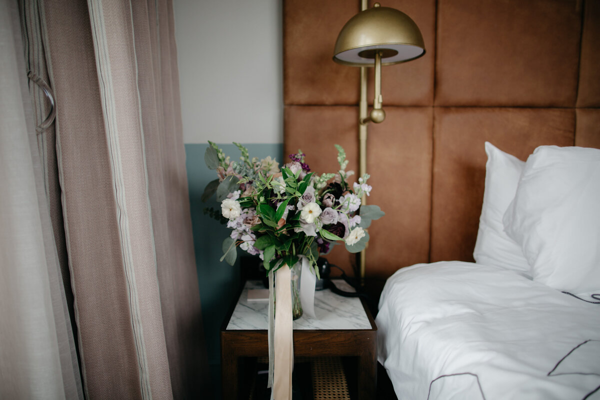 Bouquet of flowers sitting on nightstand in Chicago hotel room