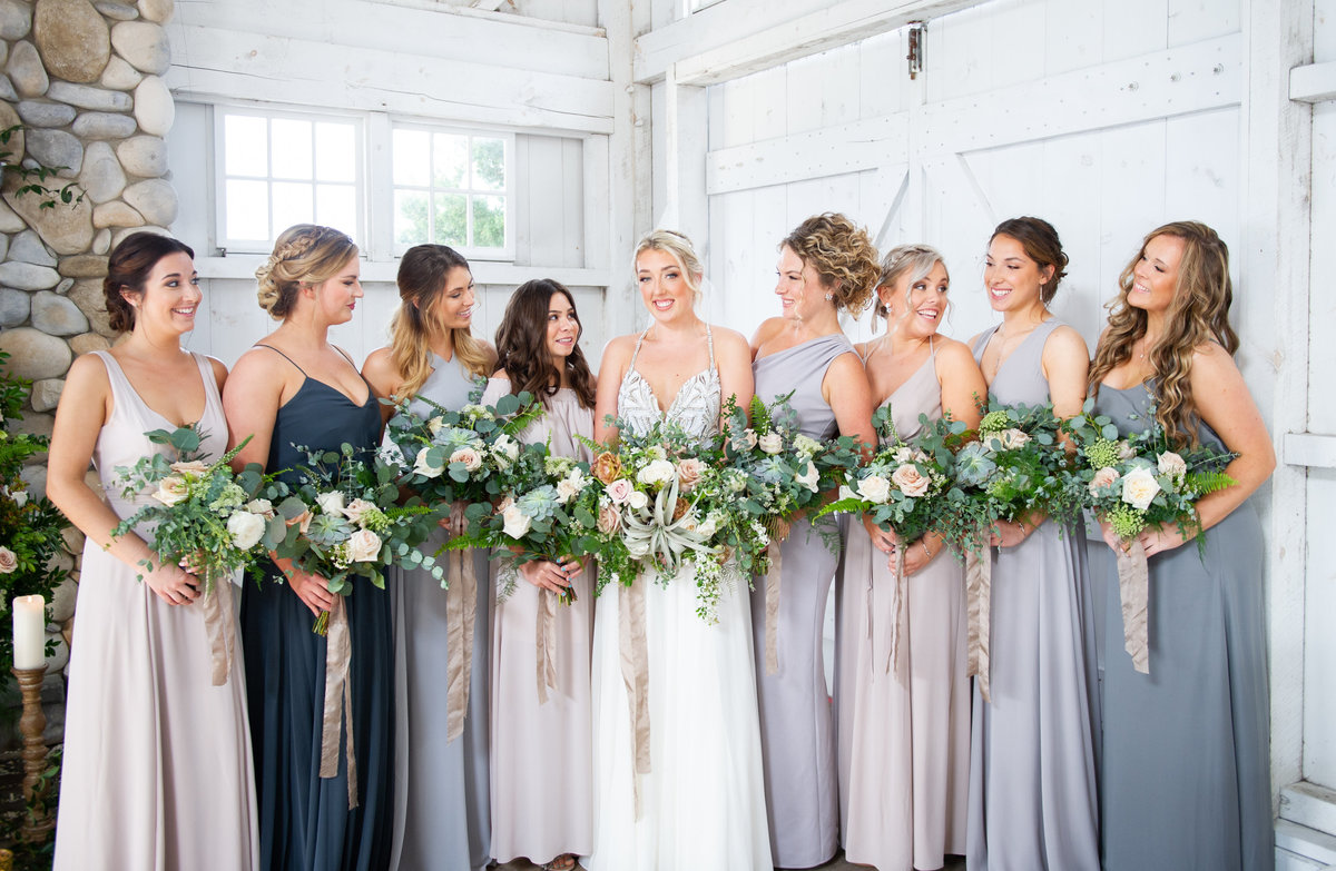 bridesmaids in different shades of blue at bonnet island