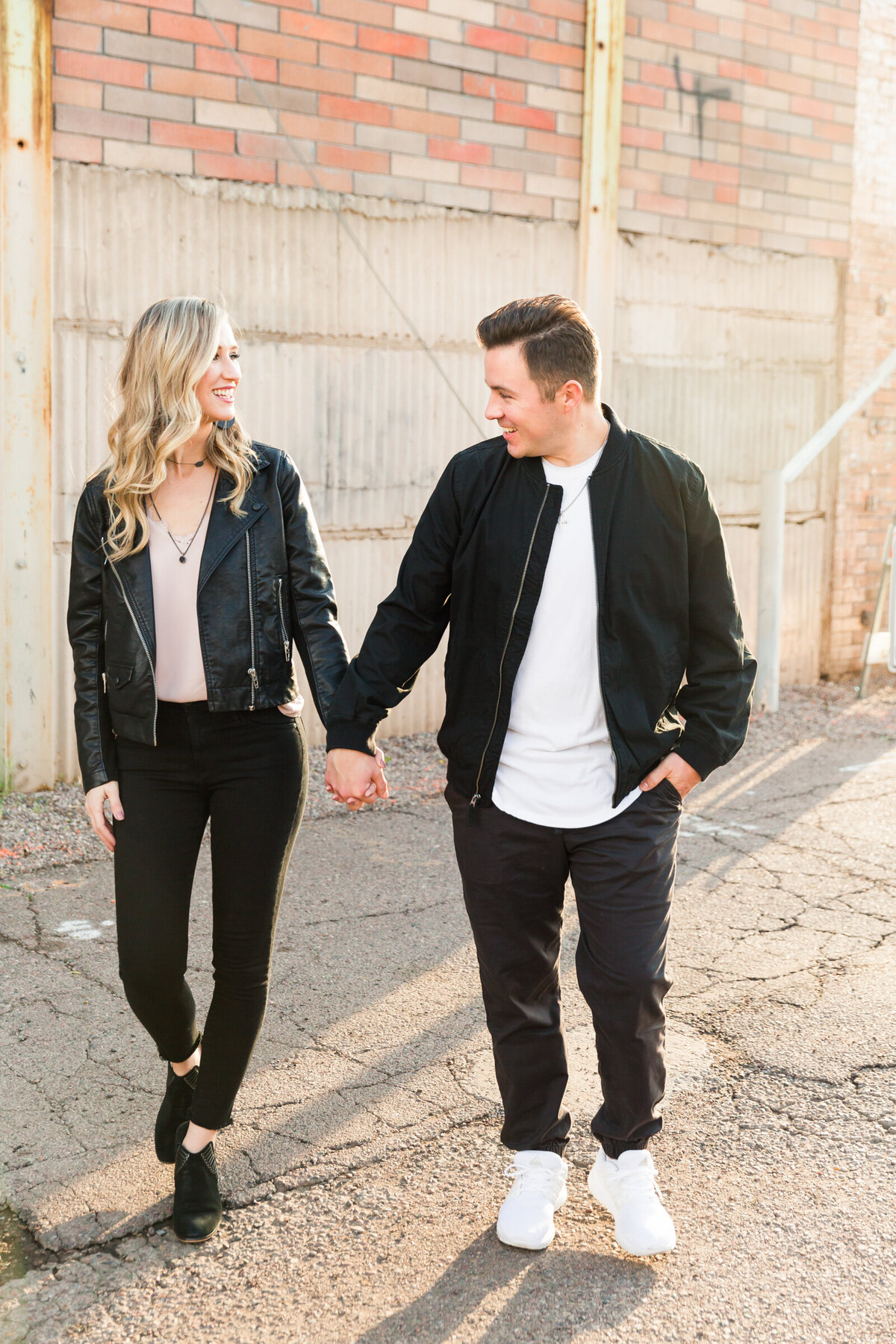 couple walking together for downtown Phoenix couple photo session