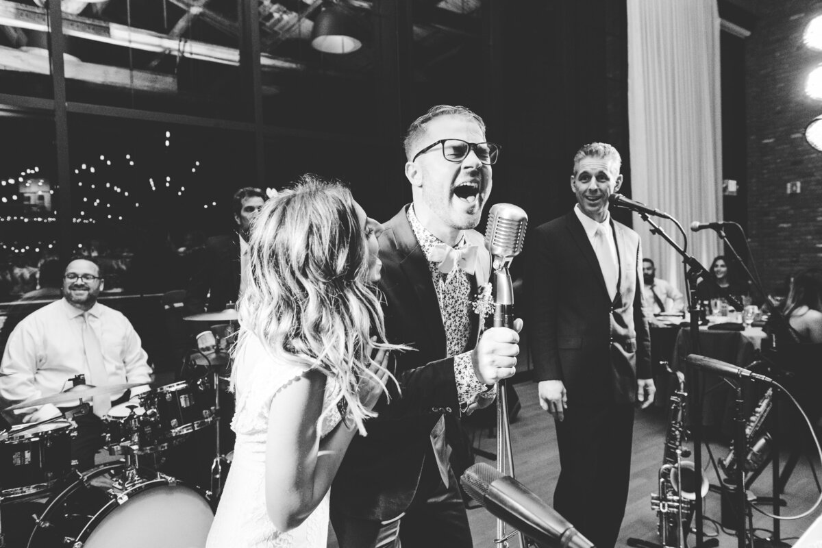 couple serenade guests during Hudson Valley wedding reception