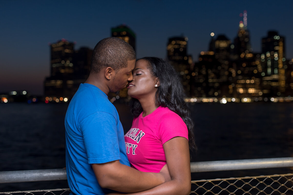 Sharing a kiss during the last light of their engagement session in New York