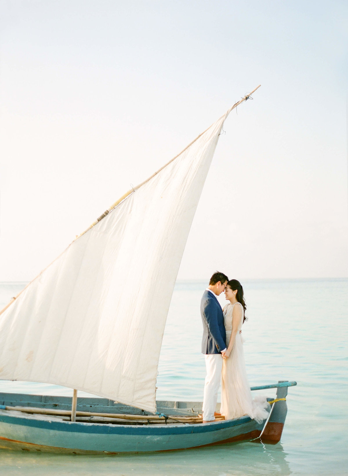 14-KTMerry-destinationwedding-Maldives-sailboat-portrait