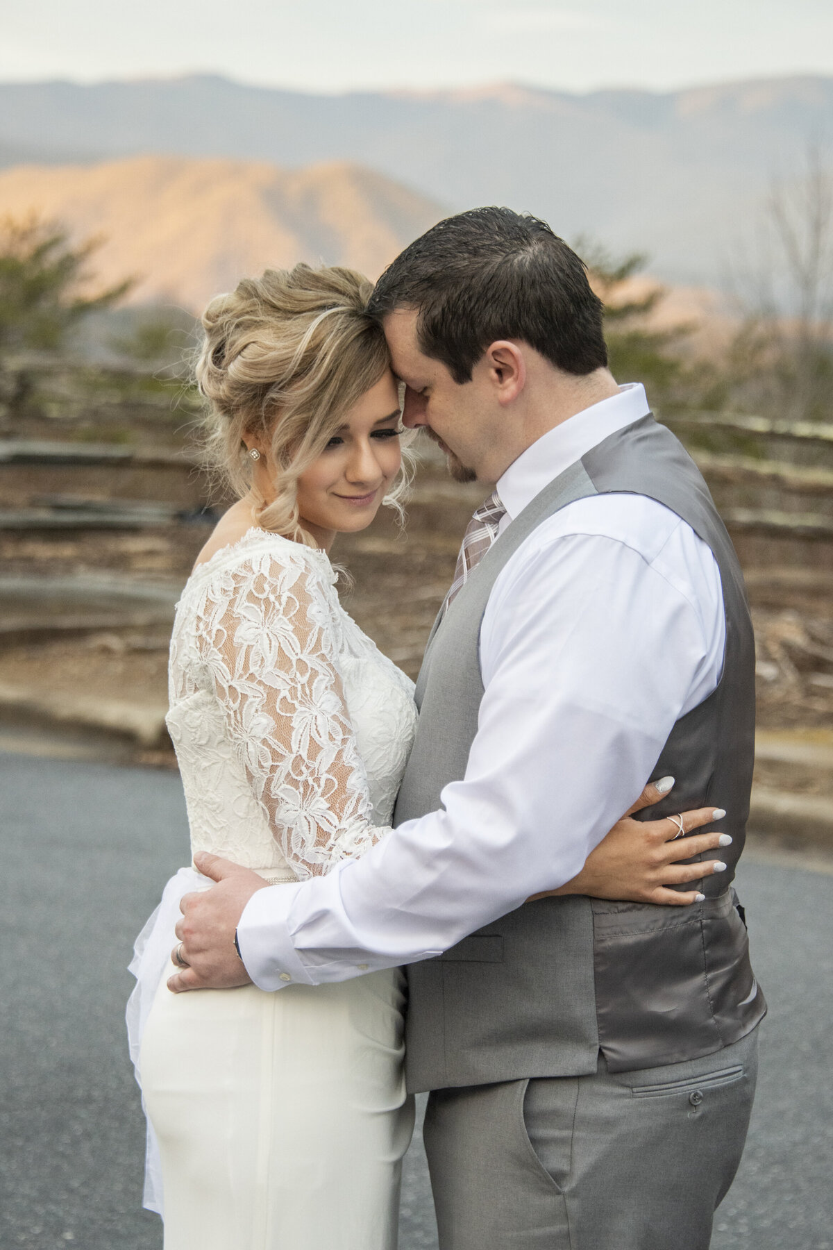 Couple hugging Mountain top wedding photography Bryson City NC
