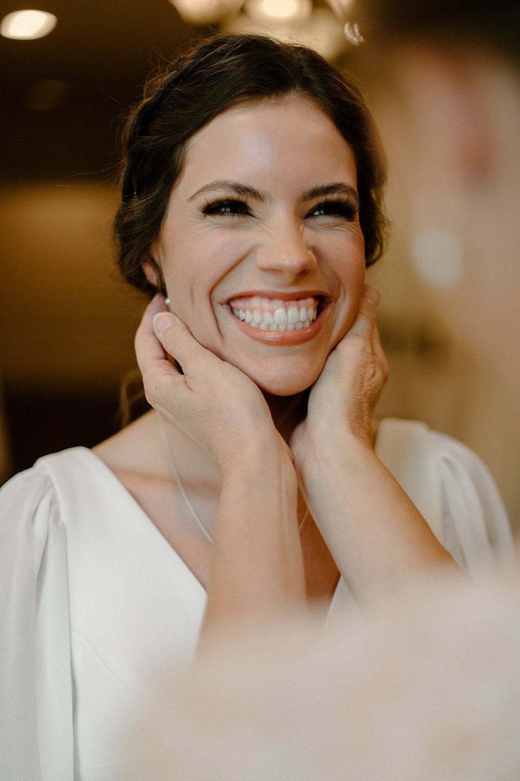bride smiling in wedding dress