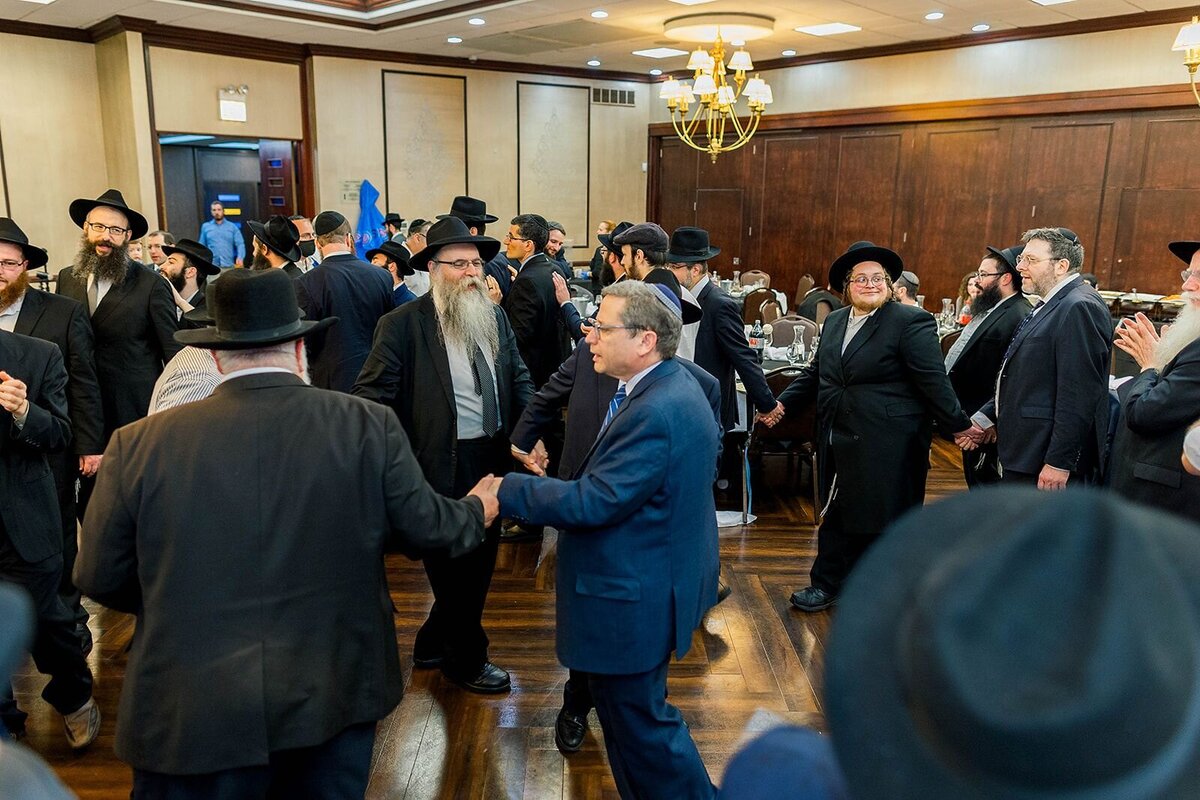 Eliana-Melmed-Photography-Chicago-LosAngeles-Jewish-WeddingPhotographer-CarmiKalman-MensDancing-00114