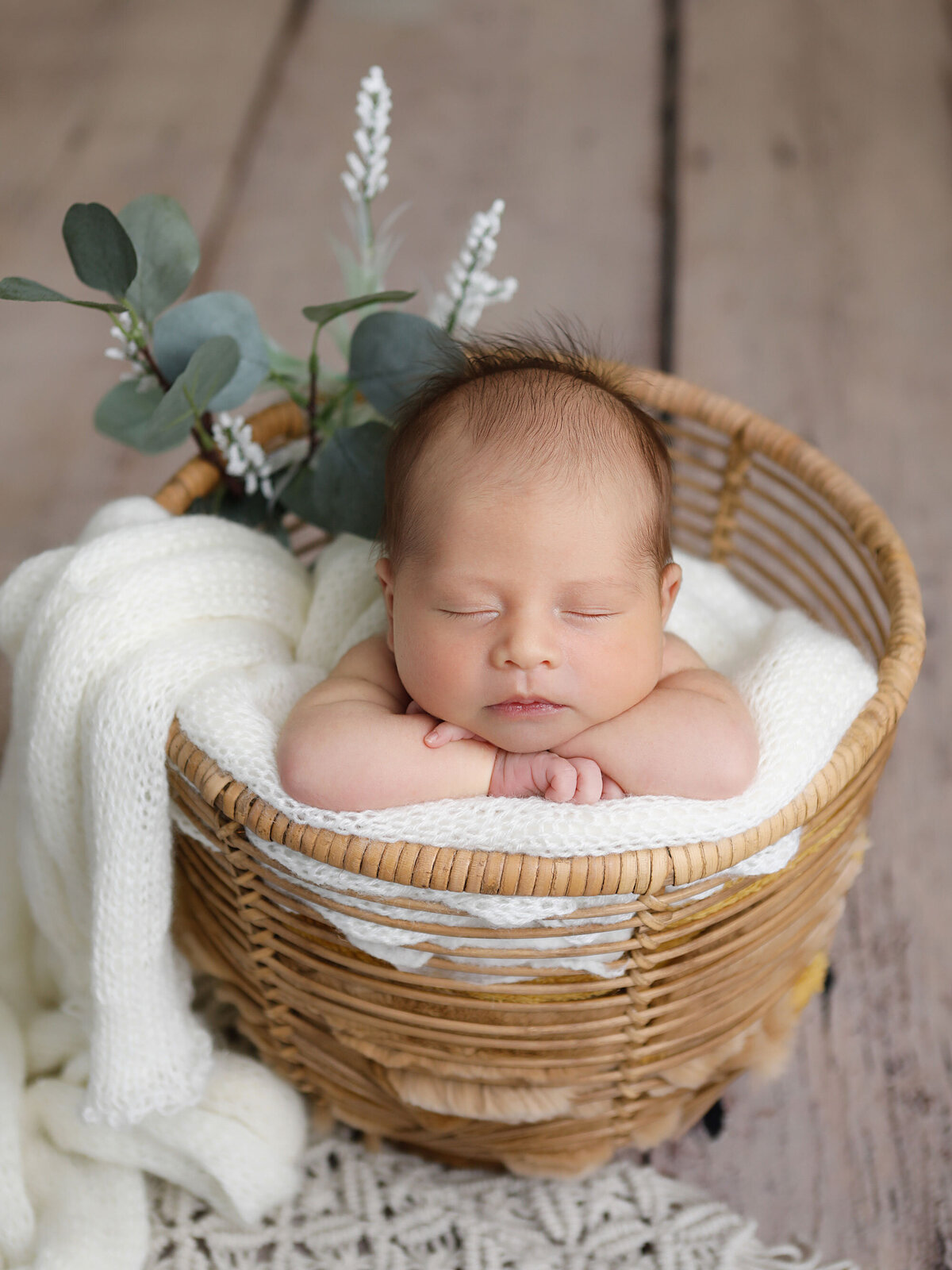 Newborn-photography-session-newborn-in-white-wrap-photo-taken-by-Janina-Botha-photographer-in-Oakville-studio-Ontario