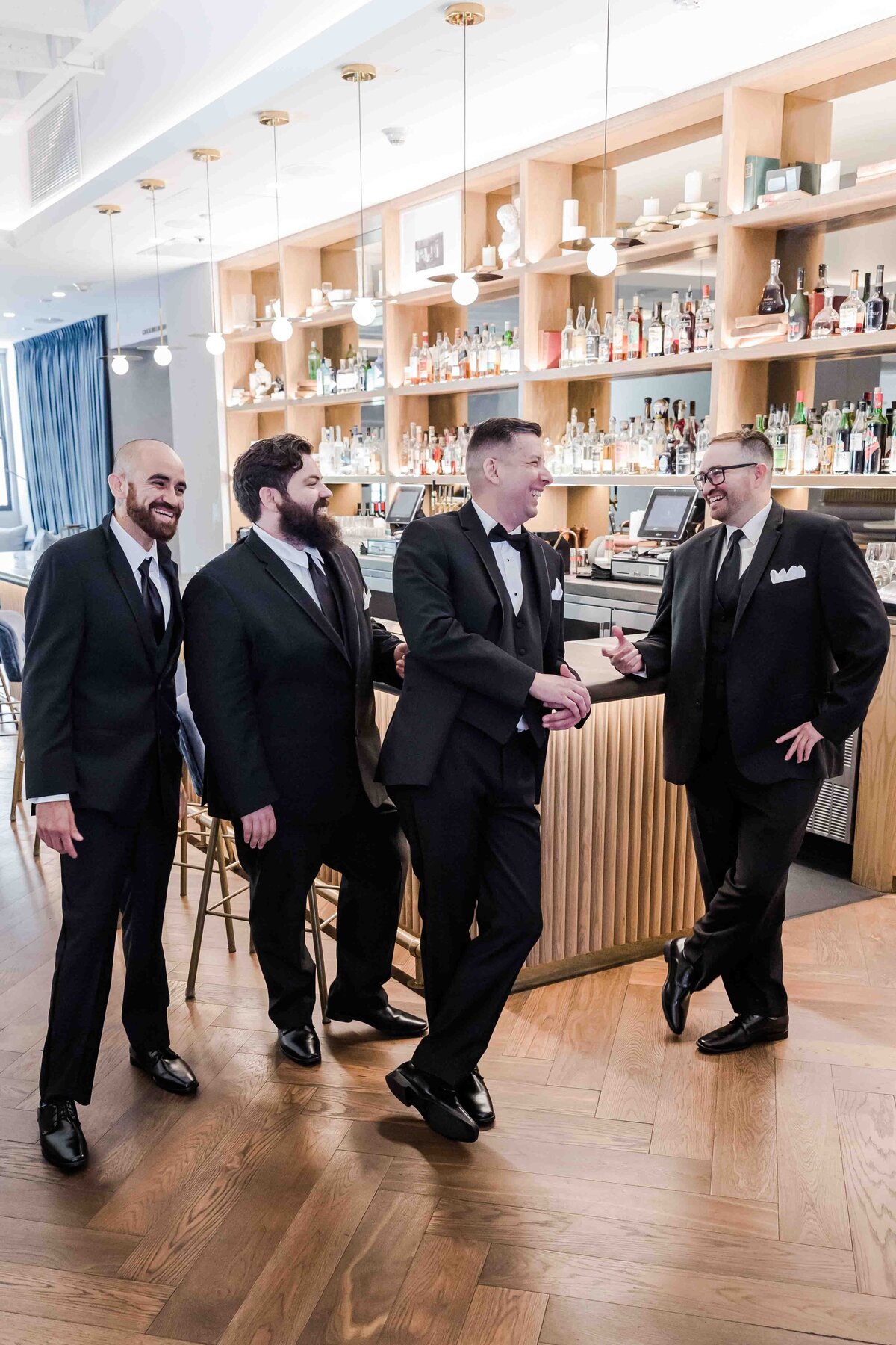 Groom-and-groomsmen-at-bar-guild-hotel