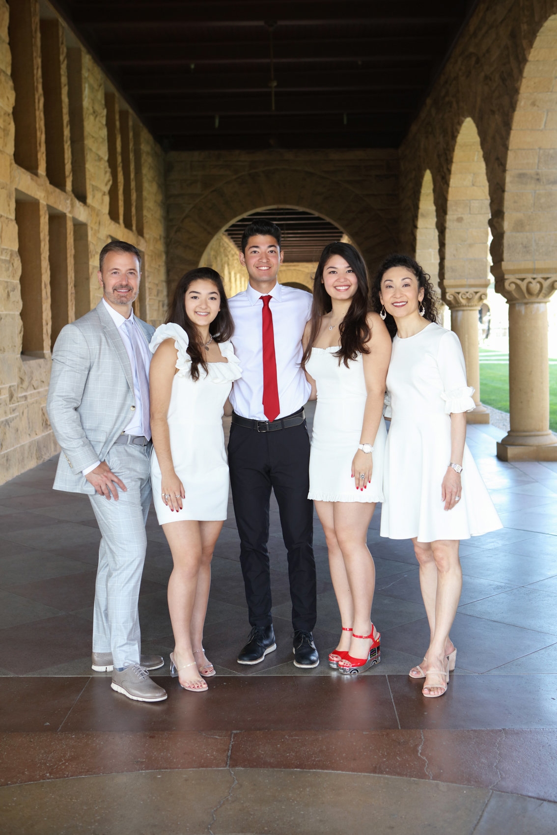 Stanford graduate with family, outdoor photoshoot