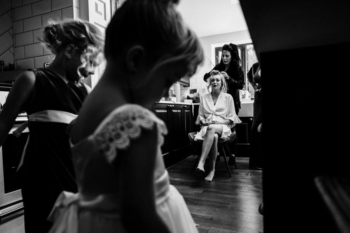 Bride sees her daughter in her flowergirl dress for the first itme