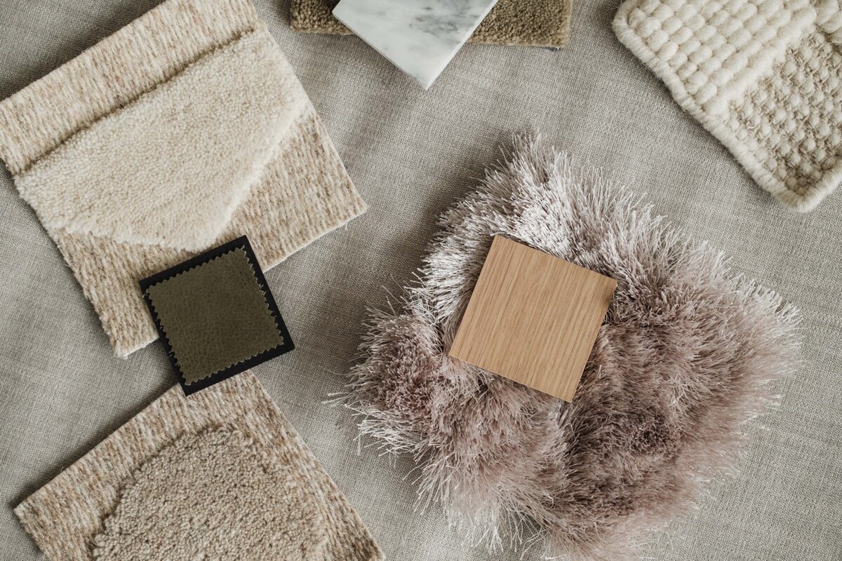 kaboompics_interior-design-material-board-home-styling-a-neutral-color-scheme-fabric-samples-35109