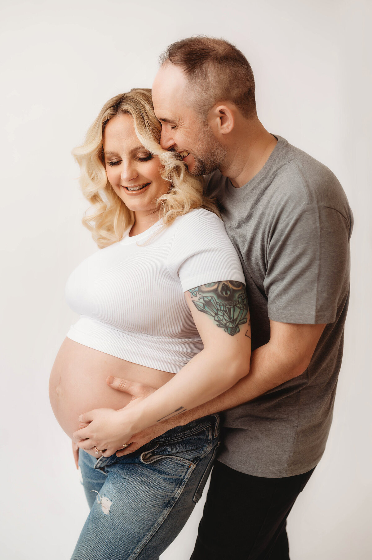 Expectant Parents pose for Studio Maternity Photos in Asheville, NC Maternity Portrait Studio.