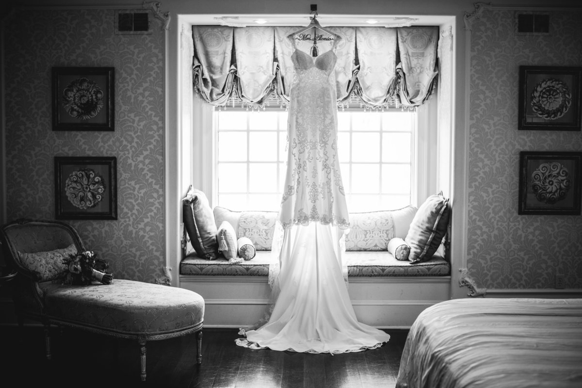 dress hanging in bridal suite at ashford estate wedding