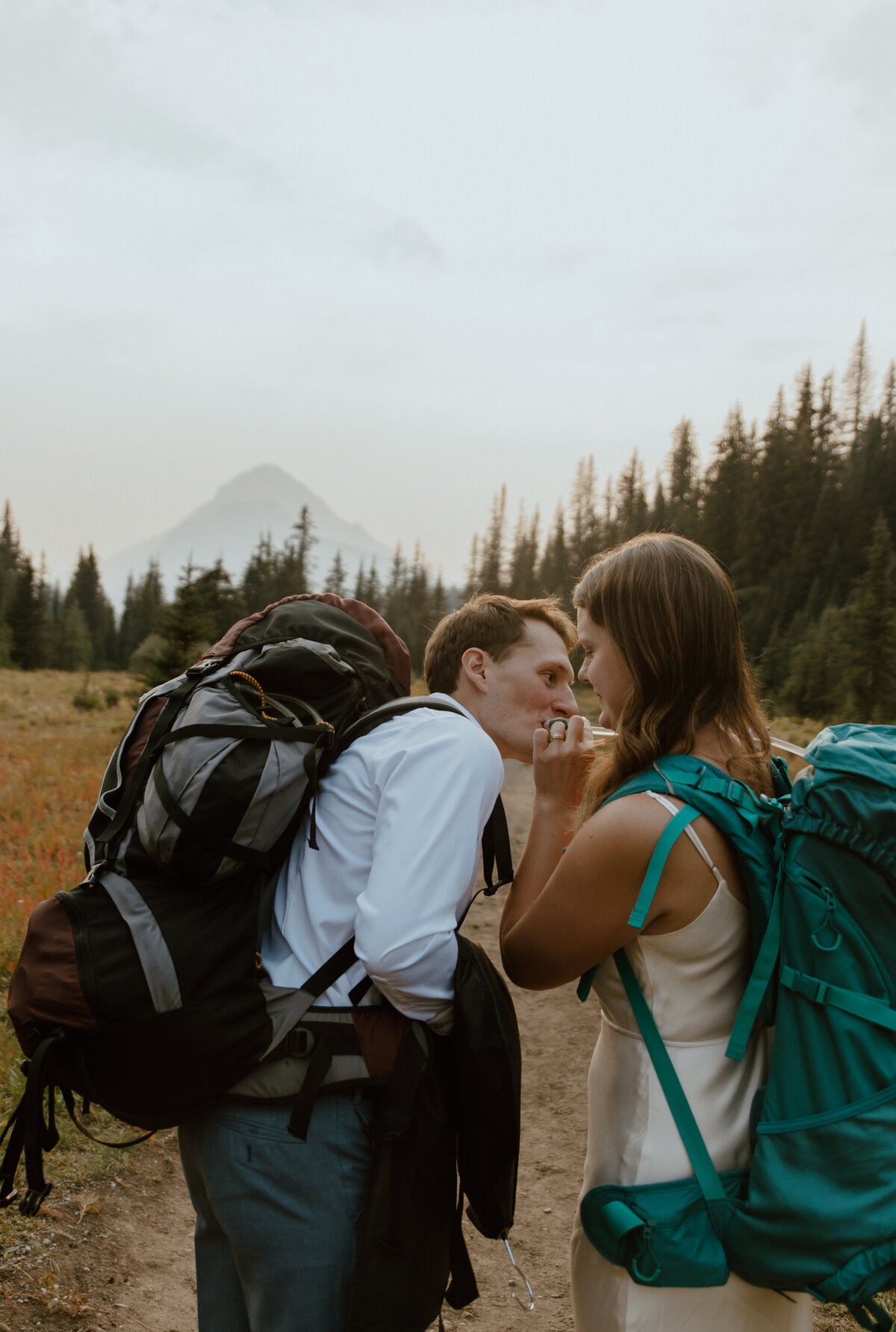 hiking couple during mountain elopement in Alberta
