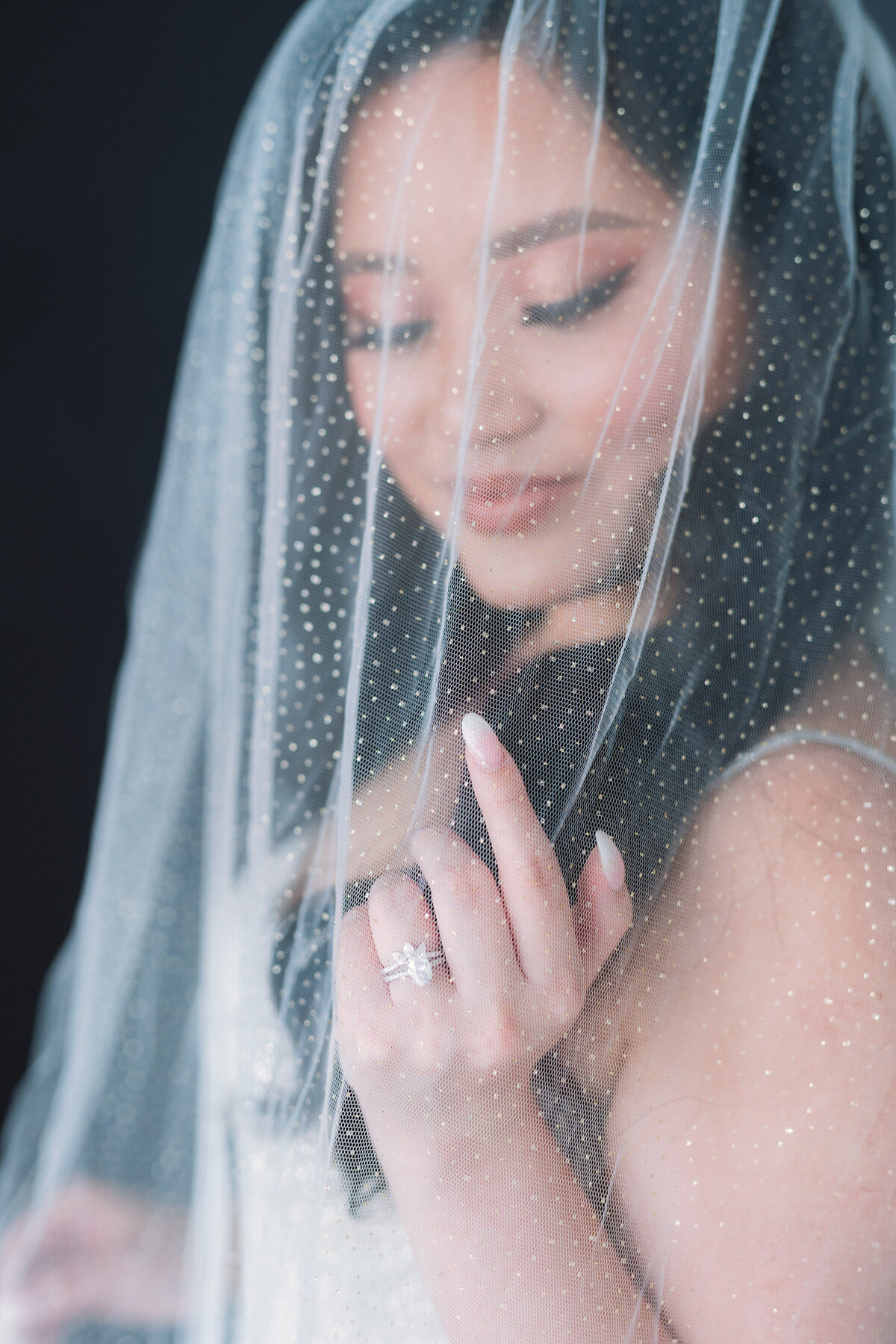 Bridal shots under the veil at luxury Dallas wedding by White Orchid Photography