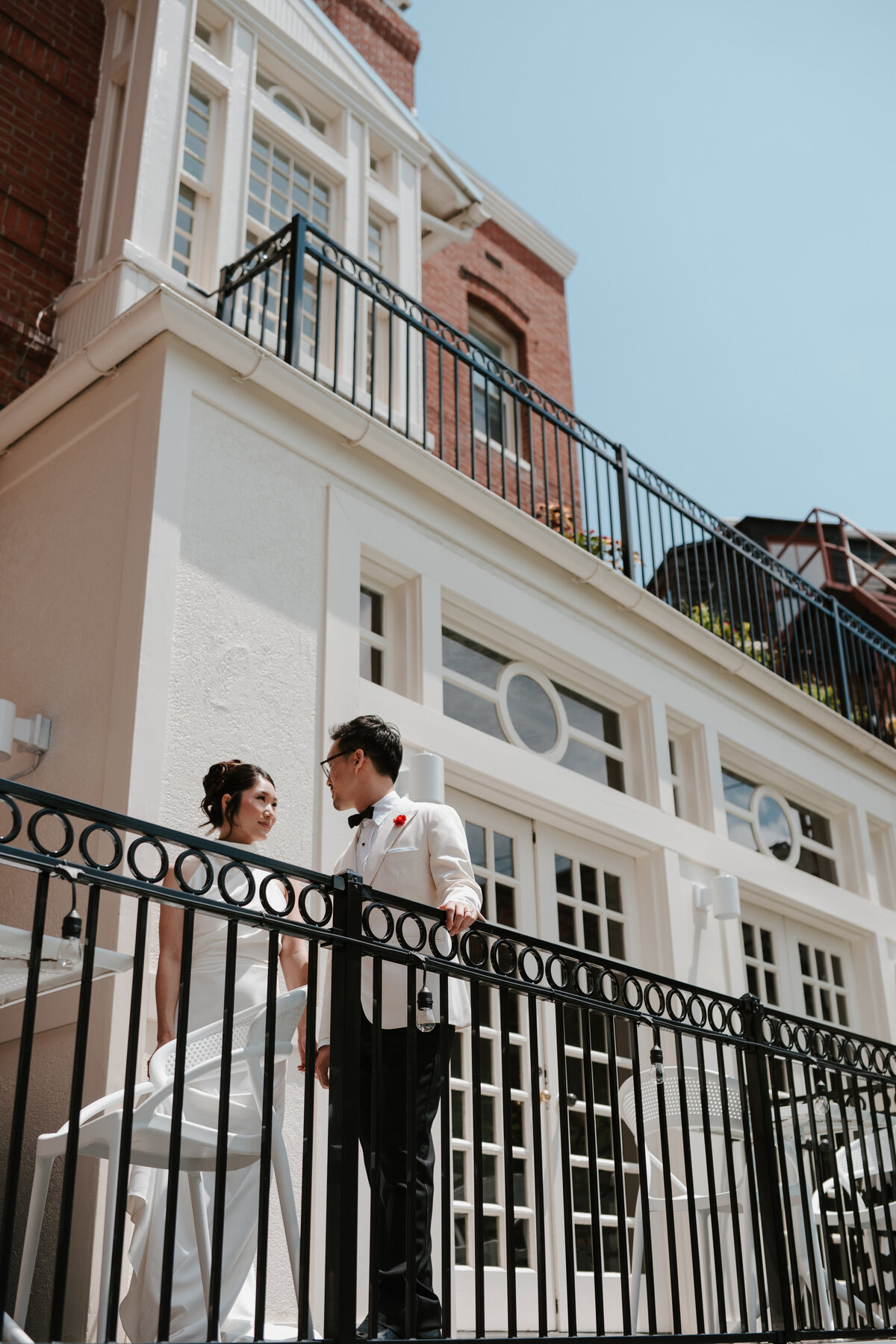 Luxury wedding reception poolside  with fine art floral design and editorial detail photography in DC