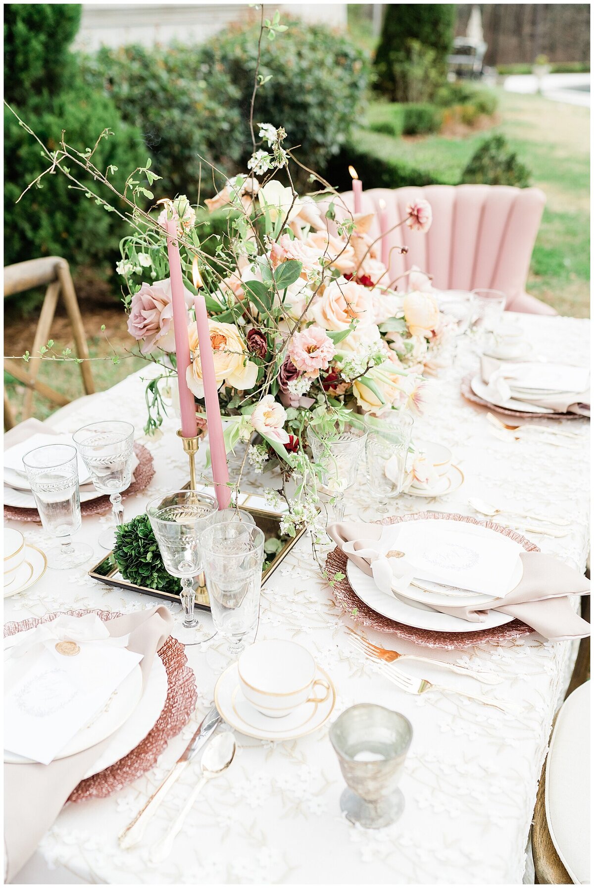 Wedding place setting with pink accents
