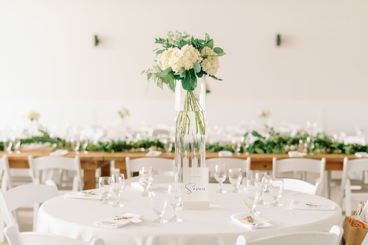 Bright and elegant indoor reception at Tin Roof Event Centre, a modern wedding venue in Lacombe, Alberta, featured on the Brontë Bride Vendor Guide.