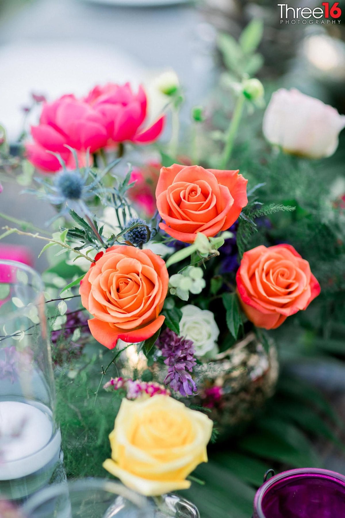 Beautiful colored roses are the table centerpieces